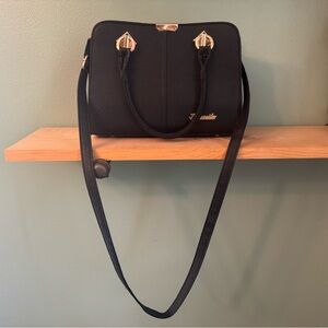 Black and Gold Crossbody Bag with Structured Design